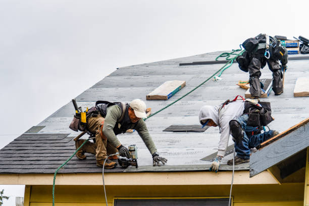 Professional Flat Roof Repair technician working in Lewiston, ME